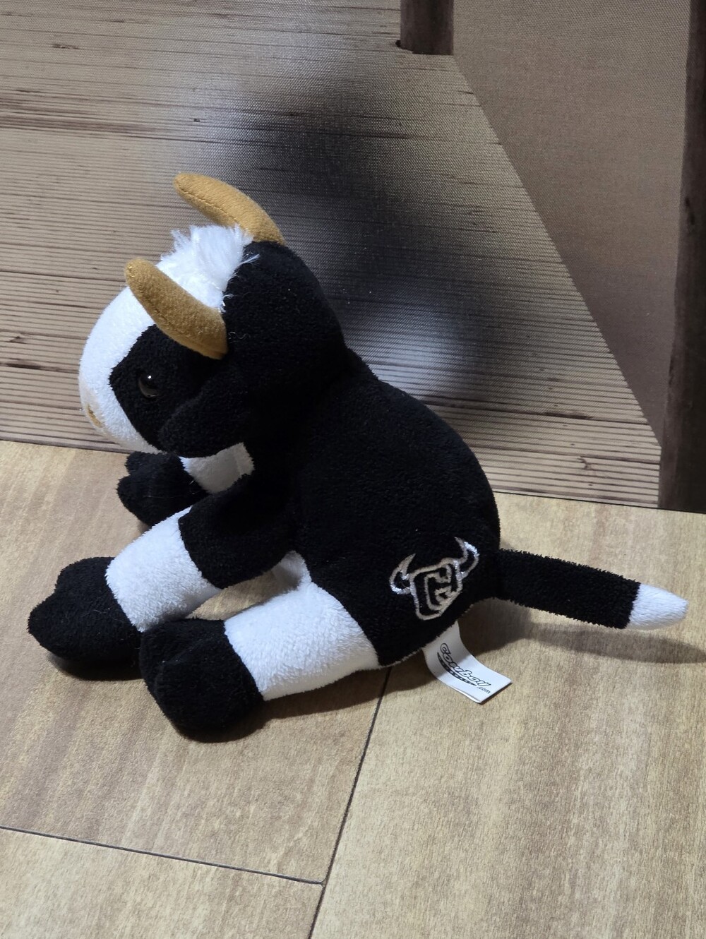 Cowboy Hardware Black and White Plush Bull with Gold Horns
